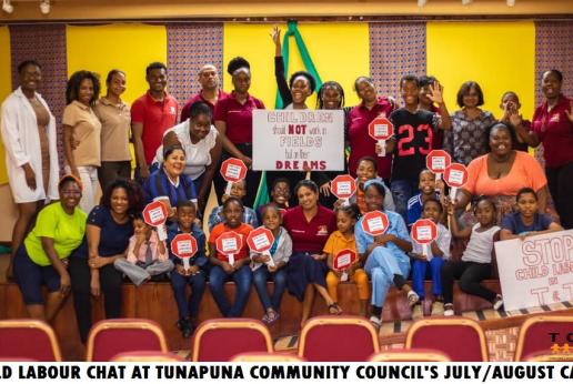 A group of children pose at a Child Labour chat