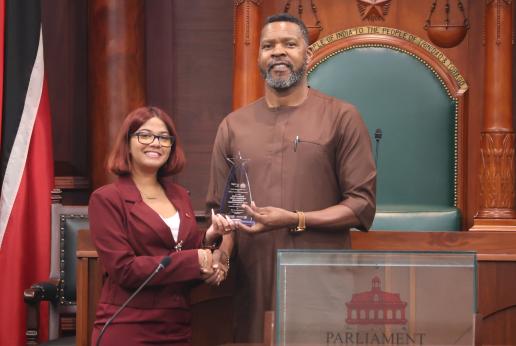 National youth parliamentarian receives a prize from the ILO Caribbean Director